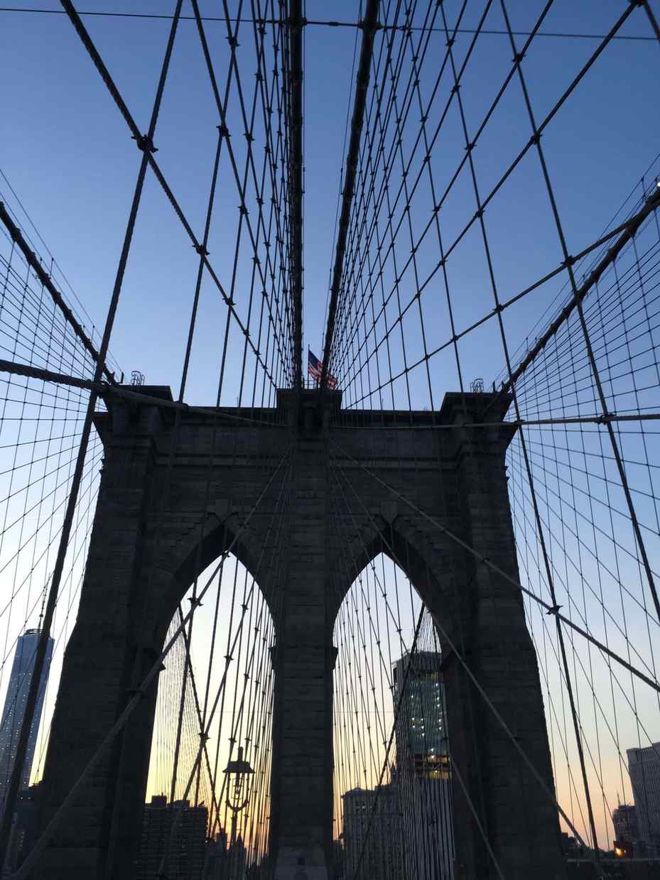 Brooklyn Bridge and New York skyline at sunset