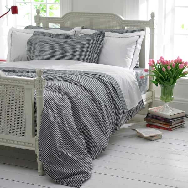 Natural linen duvet cover arranged on a bright bed