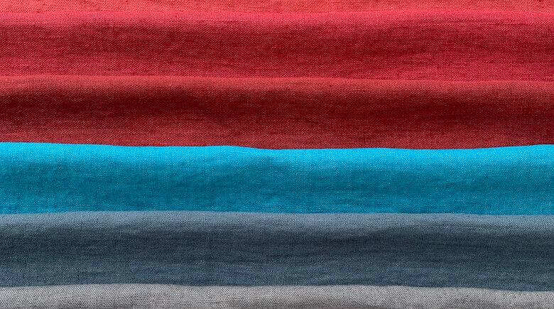 Natural linen fabric in warm oatmeal and beige tones