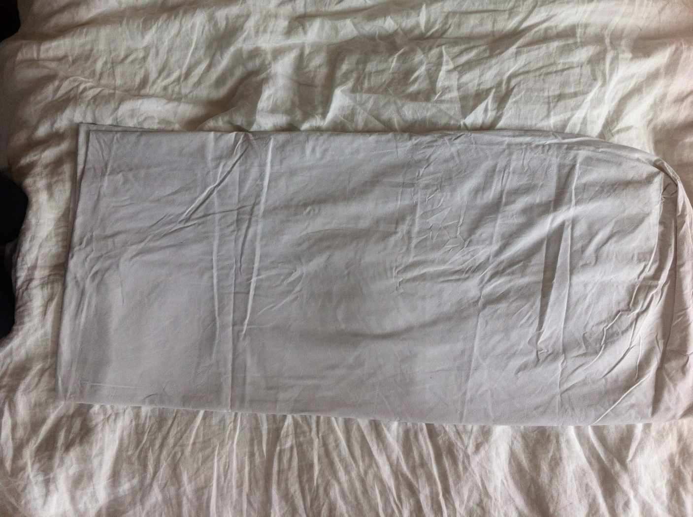Step 4: gather all fitted-sheet corners All four fitted-sheet corners nested together
