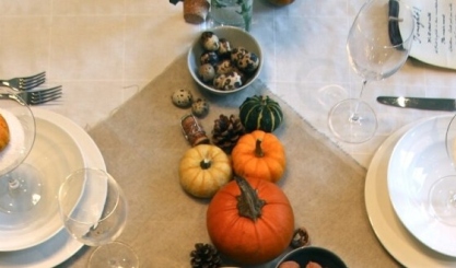 Autumn table styled with natural linen and seasonal details