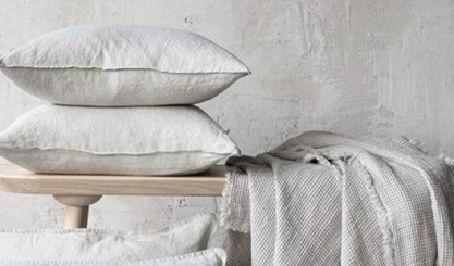 Layered linen bedding showing different types of bed linen