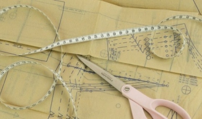 Fabric laid out for cutting with visible direction and texture