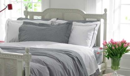 Natural linen duvet cover arranged on a bright bed