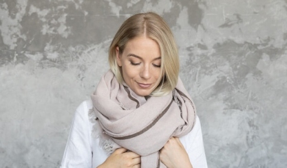 Lightweight linen scarf styled for a relaxed summer outfit