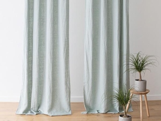 Light-filled interior styled with natural linen textiles