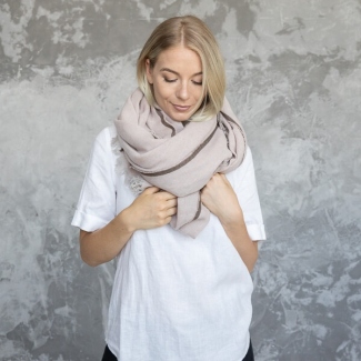 Lightweight linen scarf styled for a relaxed summer outfit