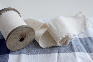 Fabric edge being sealed for a no-sew project