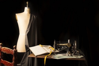 Fabric being measured and cut straight for sewing
